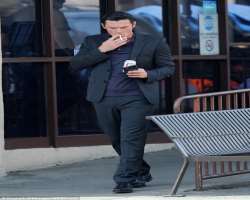 Luke Evans smoking